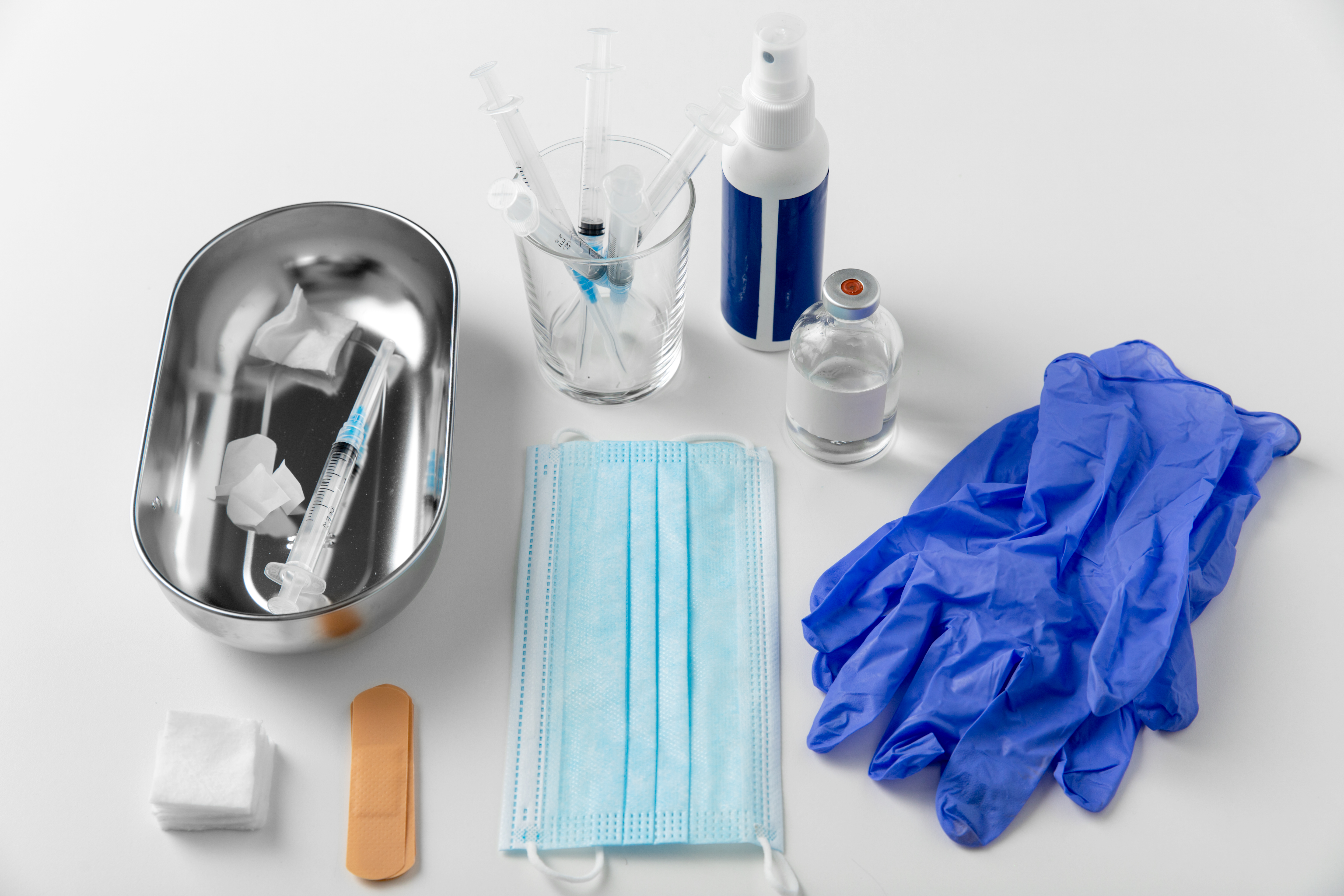 Laminated non-woven PPE coverall and apron.